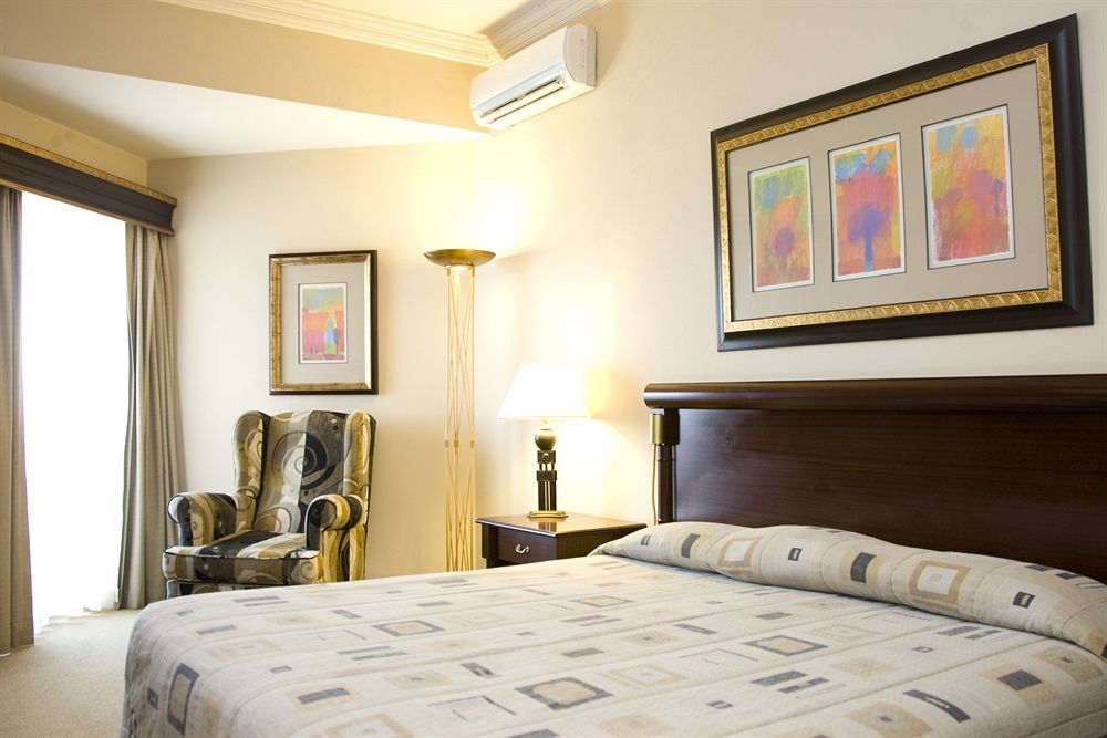Hotel Alvalade Luanda Oda fotoğraf